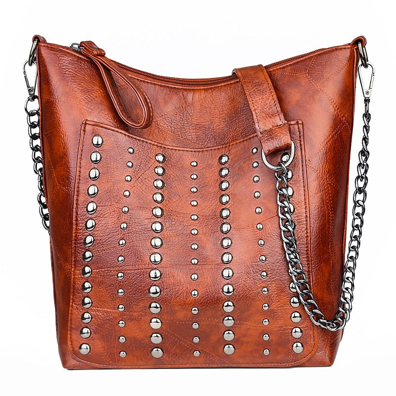 Limited Time Sale! High Quality Riveted Faux Leather Handbag. Great Size For Any Occasion! Few Stock Left.