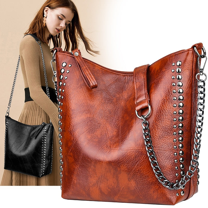 Limited Time Sale! High Quality Riveted Faux Leather Handbag. Great Size For Any Occasion! Few Stock Left.