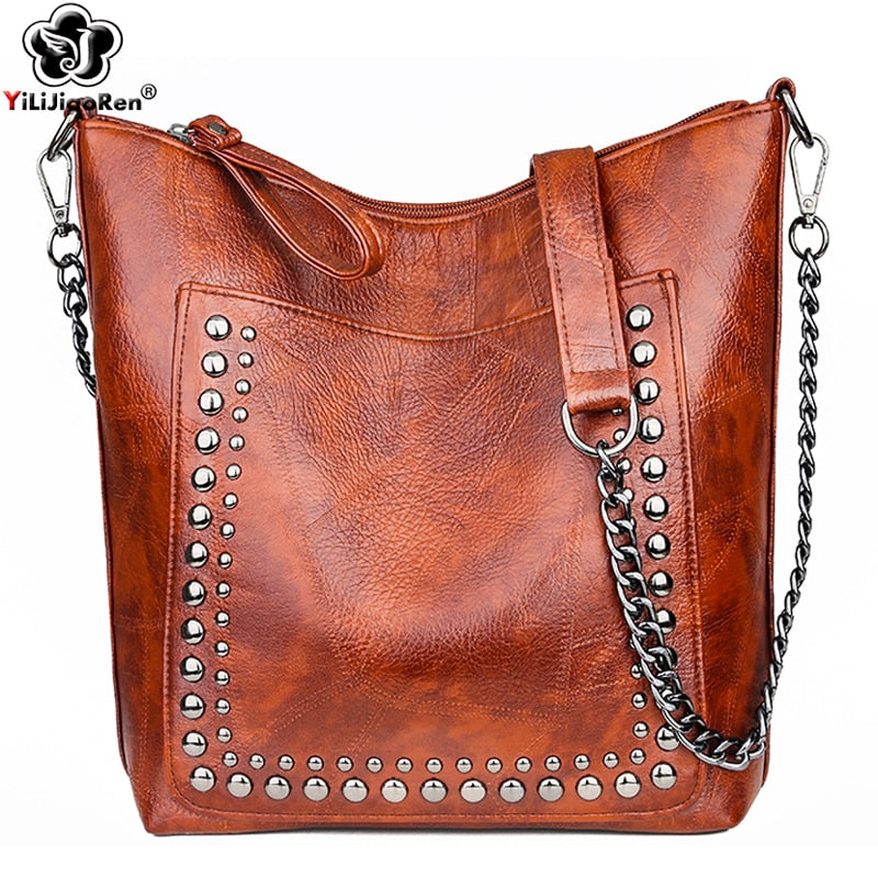 Limited Time Sale! High Quality Riveted Faux Leather Handbag. Great Size For Any Occasion! Few Stock Left.