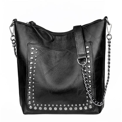 Limited Time Sale! High Quality Riveted Faux Leather Handbag. Great Size For Any Occasion! Few Stock Left.