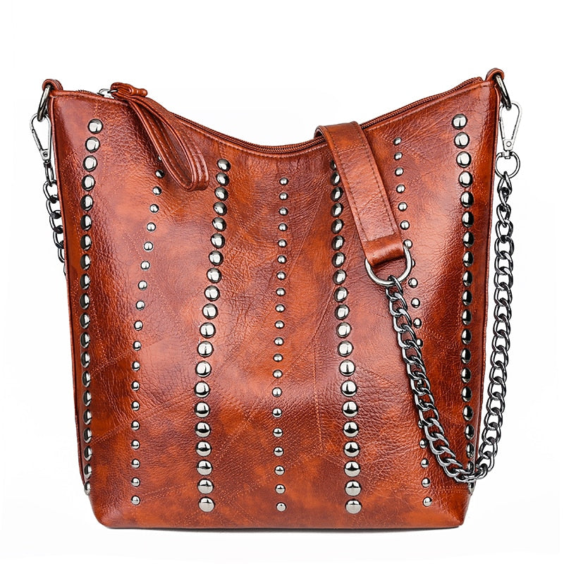 Limited Time Sale! High Quality Riveted Faux Leather Handbag. Great Size For Any Occasion! Few Stock Left.