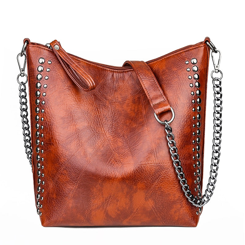 Limited Time Sale! High Quality Riveted Faux Leather Handbag. Great Size For Any Occasion! Few Stock Left.