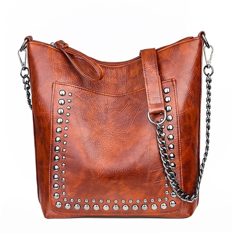 Limited Time Sale! High Quality Riveted Faux Leather Handbag. Great Size For Any Occasion! Few Stock Left.