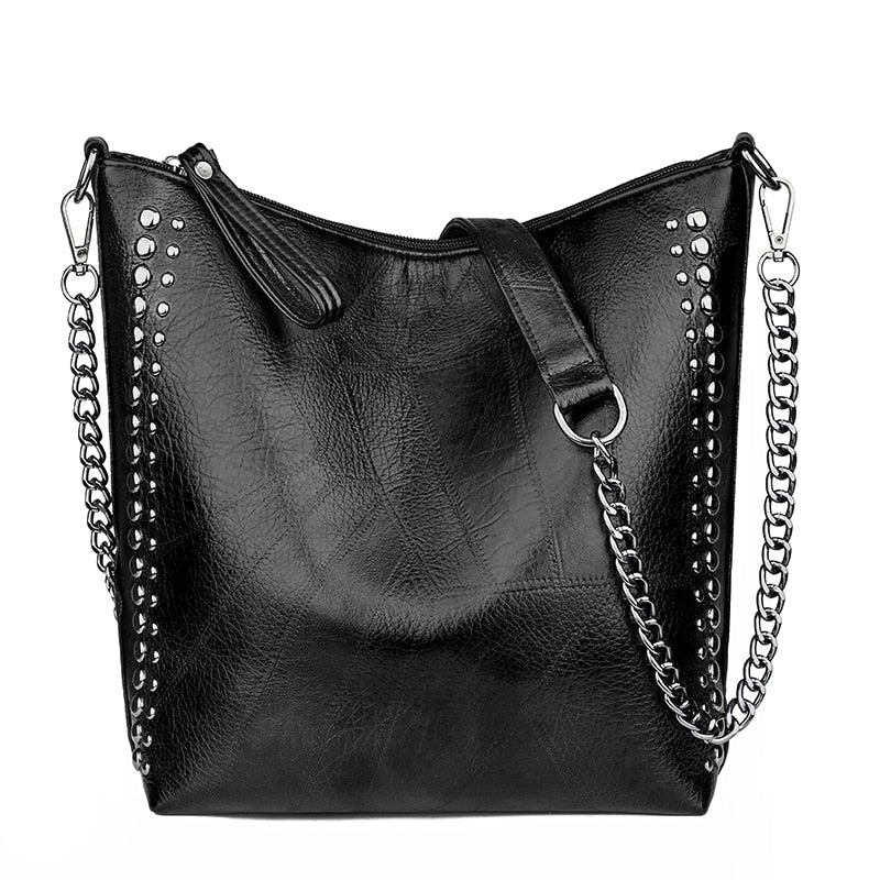 Limited Time Sale! High Quality Riveted Faux Leather Handbag. Great Size For Any Occasion! Few Stock Left.